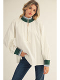 WHITE ZIP TOP WITH GREEN TRIM
