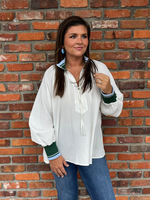 WHITE ZIP TOP WITH GREEN TRIM