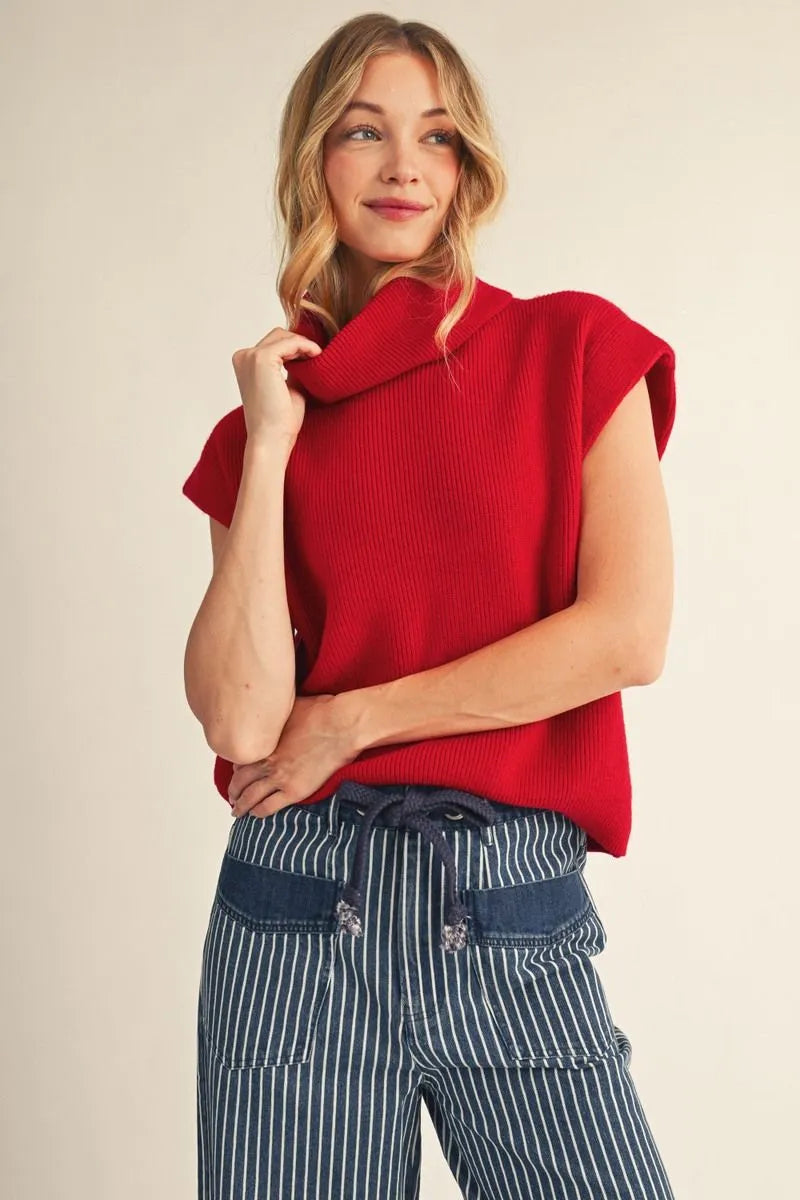 RED SLEEVELESS TURTLENECK