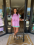 PINK SHORTS WITH GREEN AND WHITE TRIM