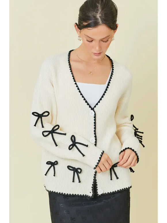 CREAM BOW SWEATER