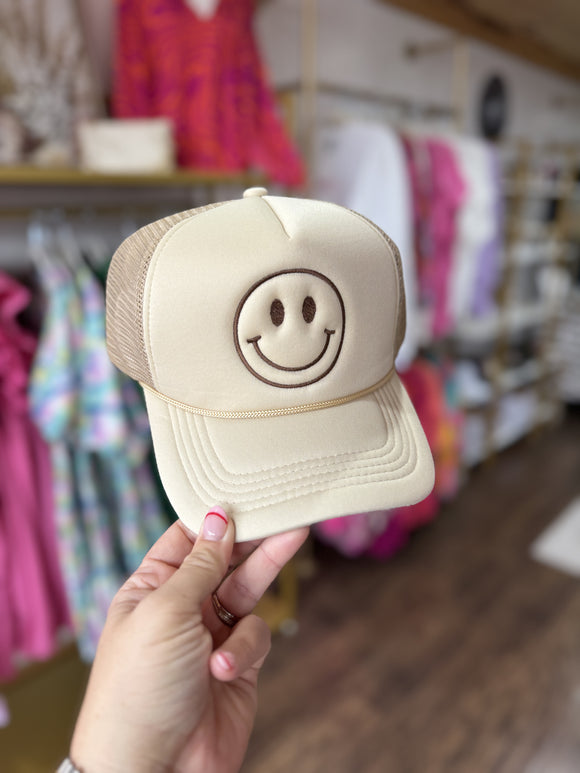 TAN TRUCKER HAT WITH BROWN SMILEY